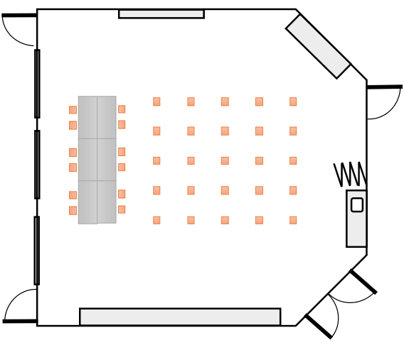 Floorplan with large table on one end with 12 chairs around the table and 20 audience chairs